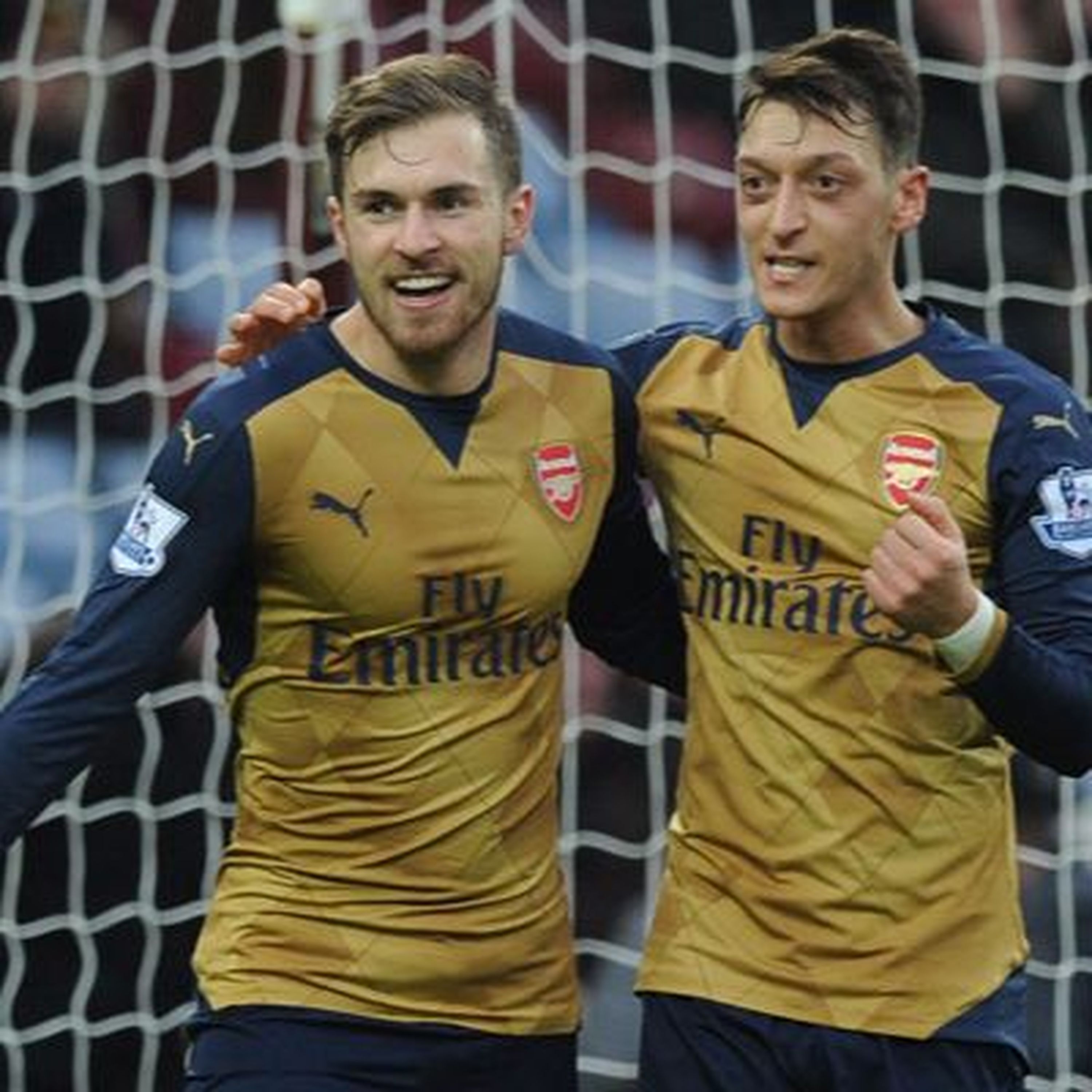 cover art for Goals from Giroud and Ramsey send Arsenal top of the Premier League