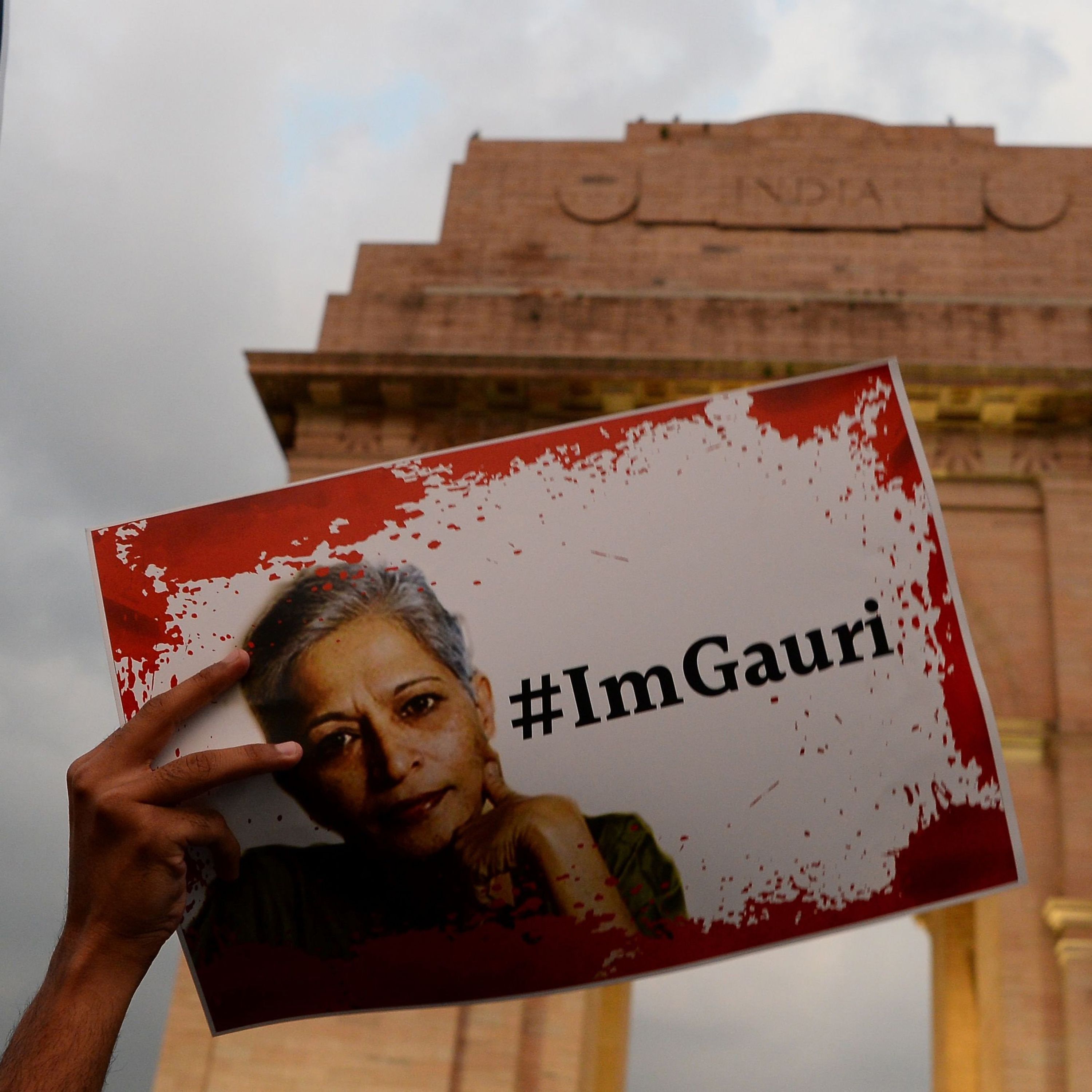 cover art for Journalist's murder ignites debate in India