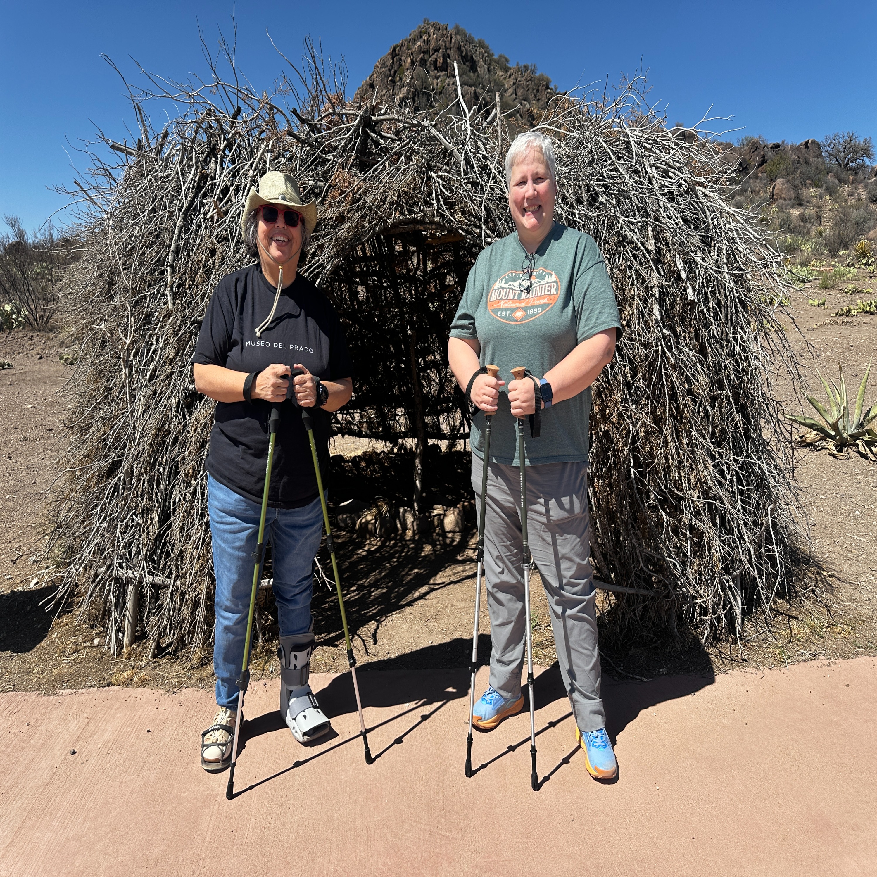 Two Chicks with Hiking Sticks