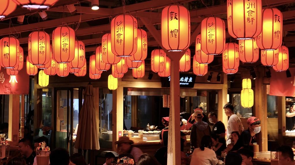 The luminous Dunhuang night market episode artwork